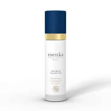 En velvære flaske Økologisk Dag creme - Infinite Quentessence 50ml anti-aging serum.